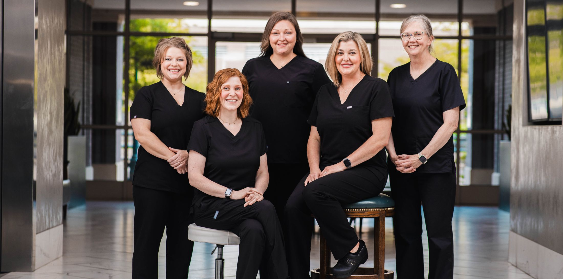 plastic surgery group of memphis support staff in the lobby